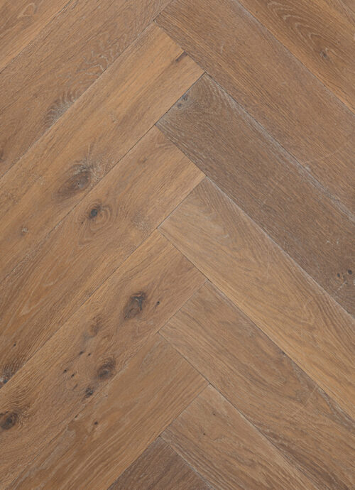 Bovenaanzicht bruine visgraat houten vloer sines