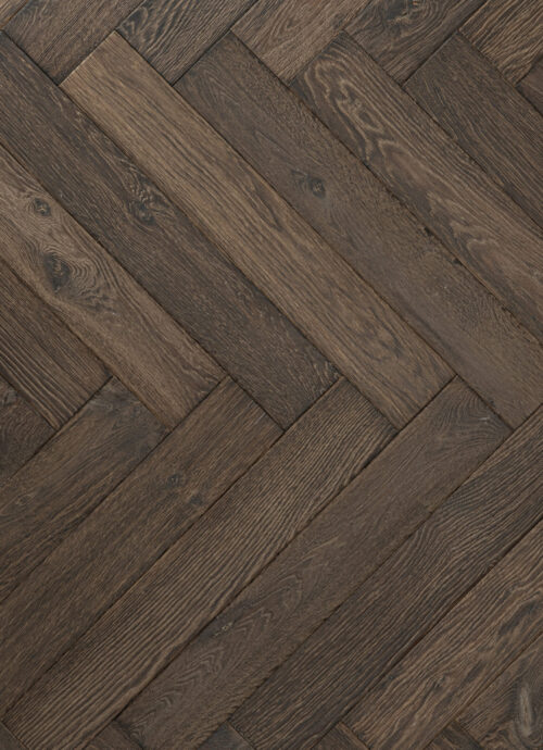 Bovenaanzicht donkerbruine visgraat houten vloer sidon