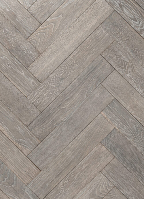 Bovenaanzicht grijze visgraat houten vloer clermont ferrand